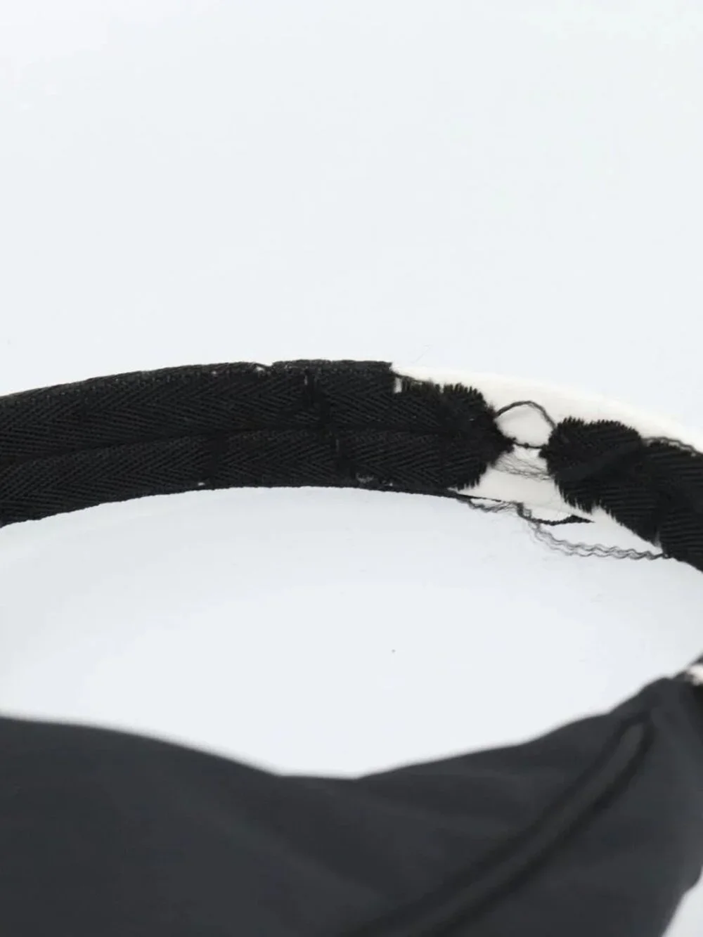 Prada brand	prada color	black